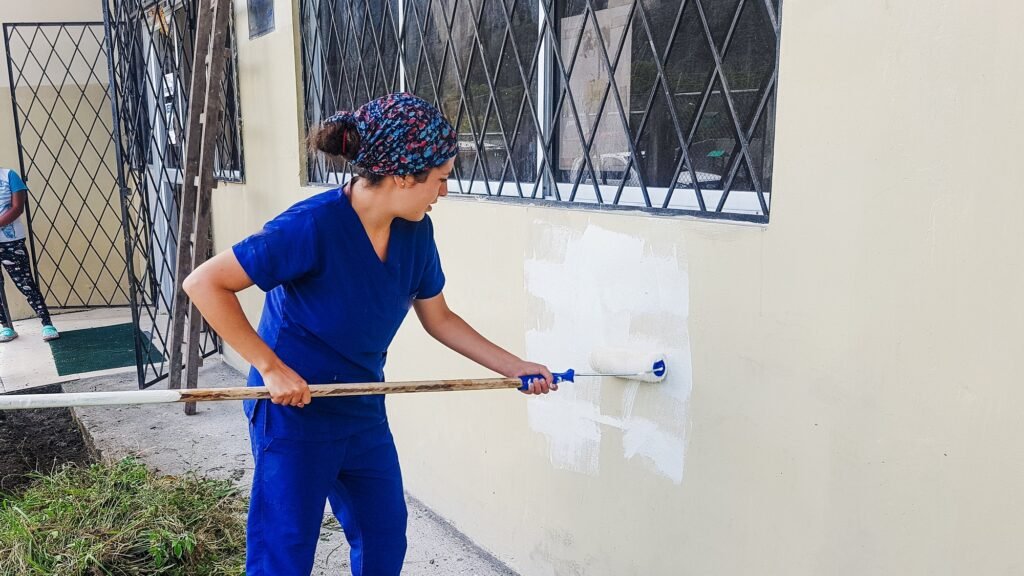 Girl painting walls